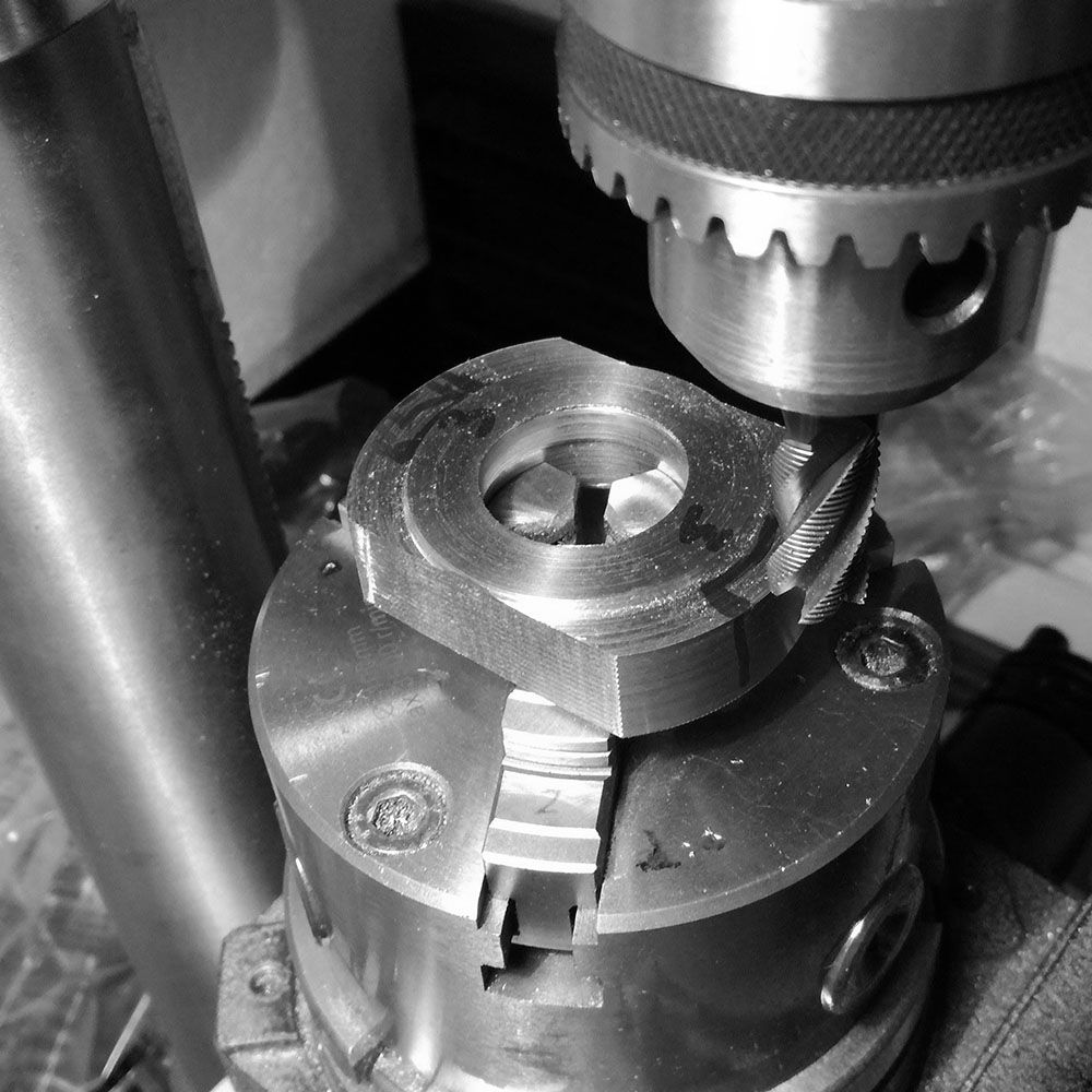 A rough designation of the interior area of the lugs is milled out.