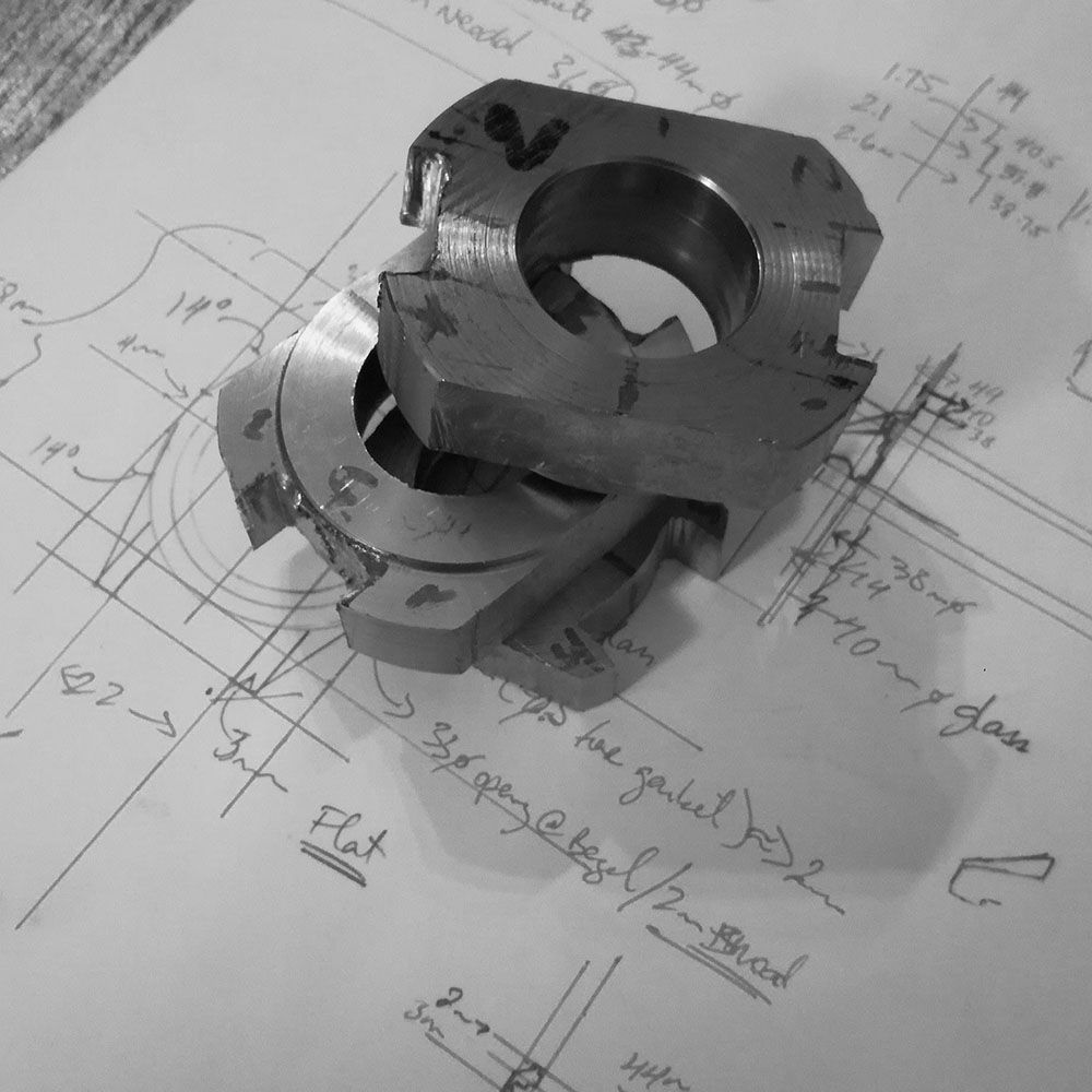 The cases have had their lugs end-milled and are ready for further work.